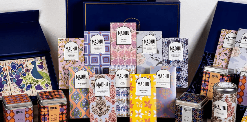 Madhu Chocolate-carouselImage-https://images.snackmagic.com/spree/provider_carousel_image/2154/bulk_medium/0spj7z7wq53m7chj1be61cym51bx.?1762163655